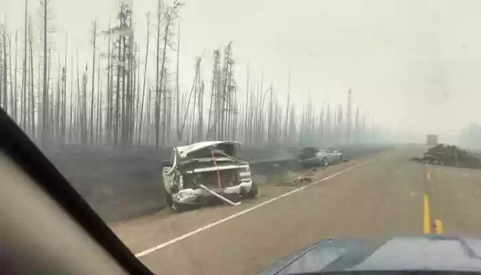 Family Flees Wildfires As Car Melts Around Them